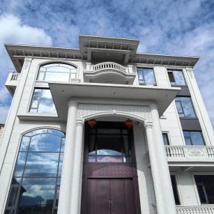 乌鲁木齐白麻别墅外墙干挂石材效果示例