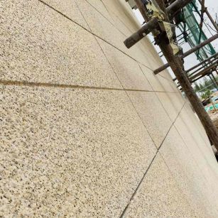 乌鲁木齐 黄金麻花岗岩荔枝面外墙干挂石材效果示例