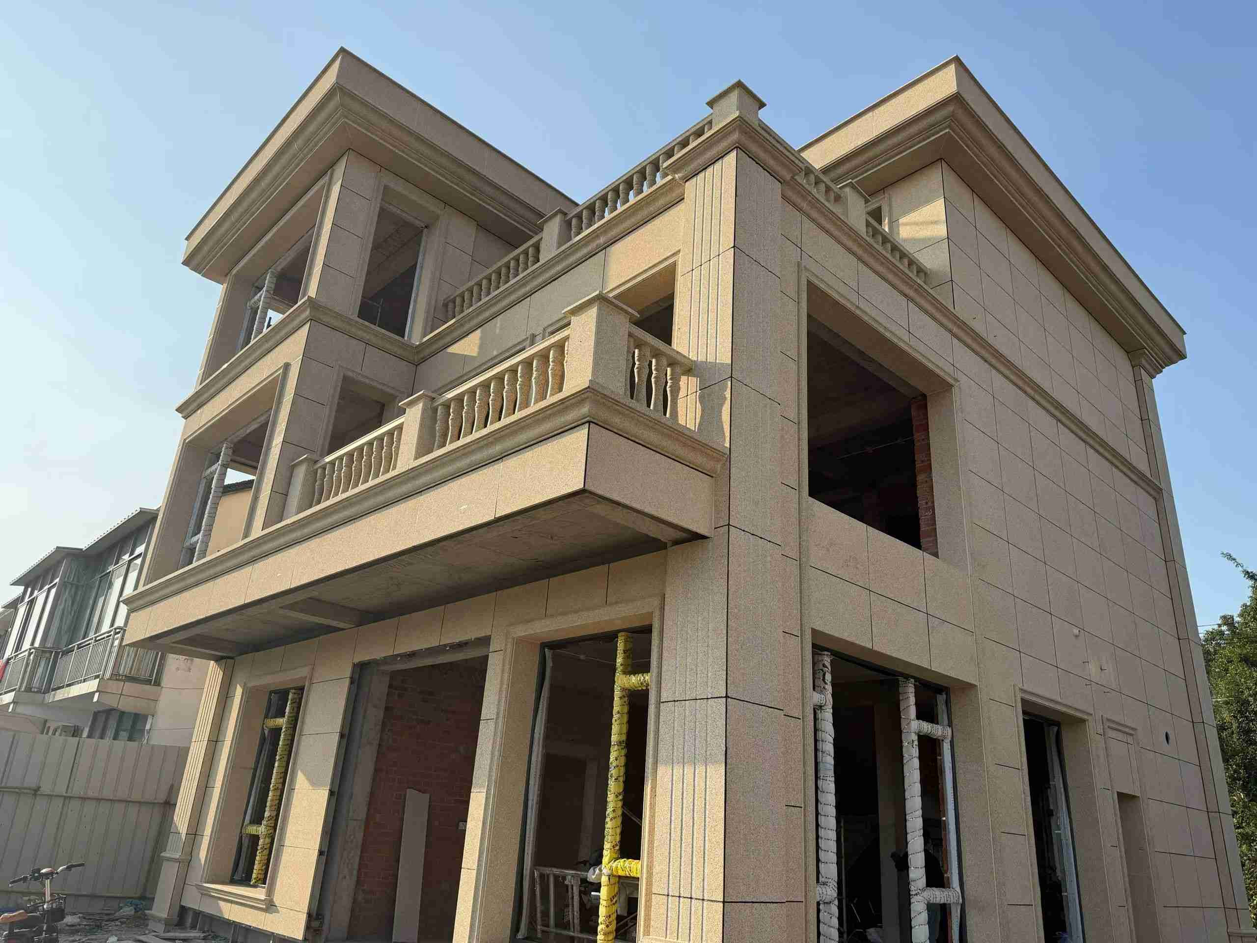 乌鲁木齐 黄金麻花岗岩石材荔枝面外墙干挂效果展示